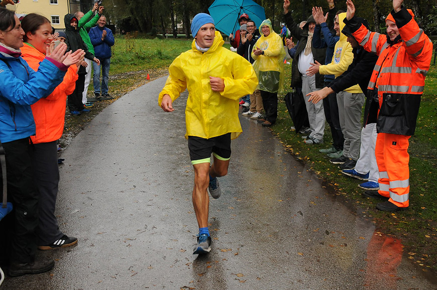 Andrea runs through the rain